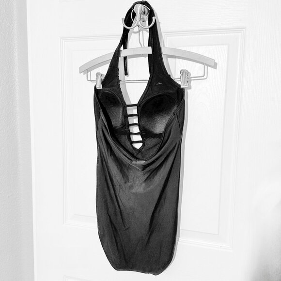 2.	One piece swimsuit, black, plunging V-neckline, body decorated with ruching. - Picture 2 of 4